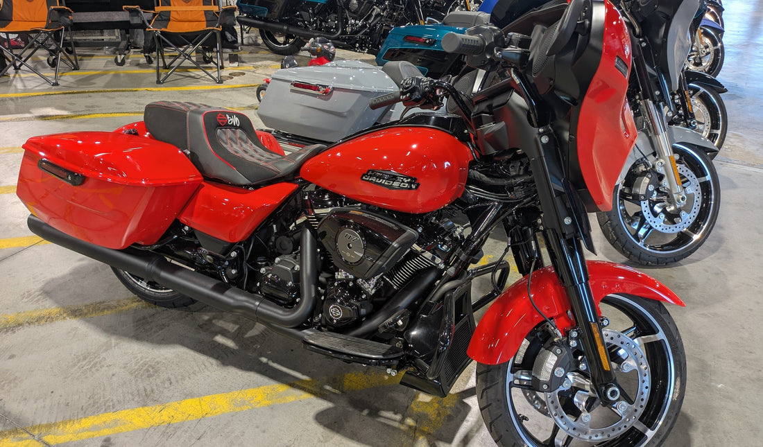Champ Customs diamond-quilted marine vinyl seat with red contrast stitching and BVO logo on Harley-Davidson CVO Touring bagger