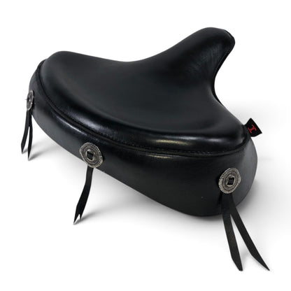 Champ Customs Shop black leather solo motorcycle seat with decorative conchos and skirt for vintage Harley-Davidson