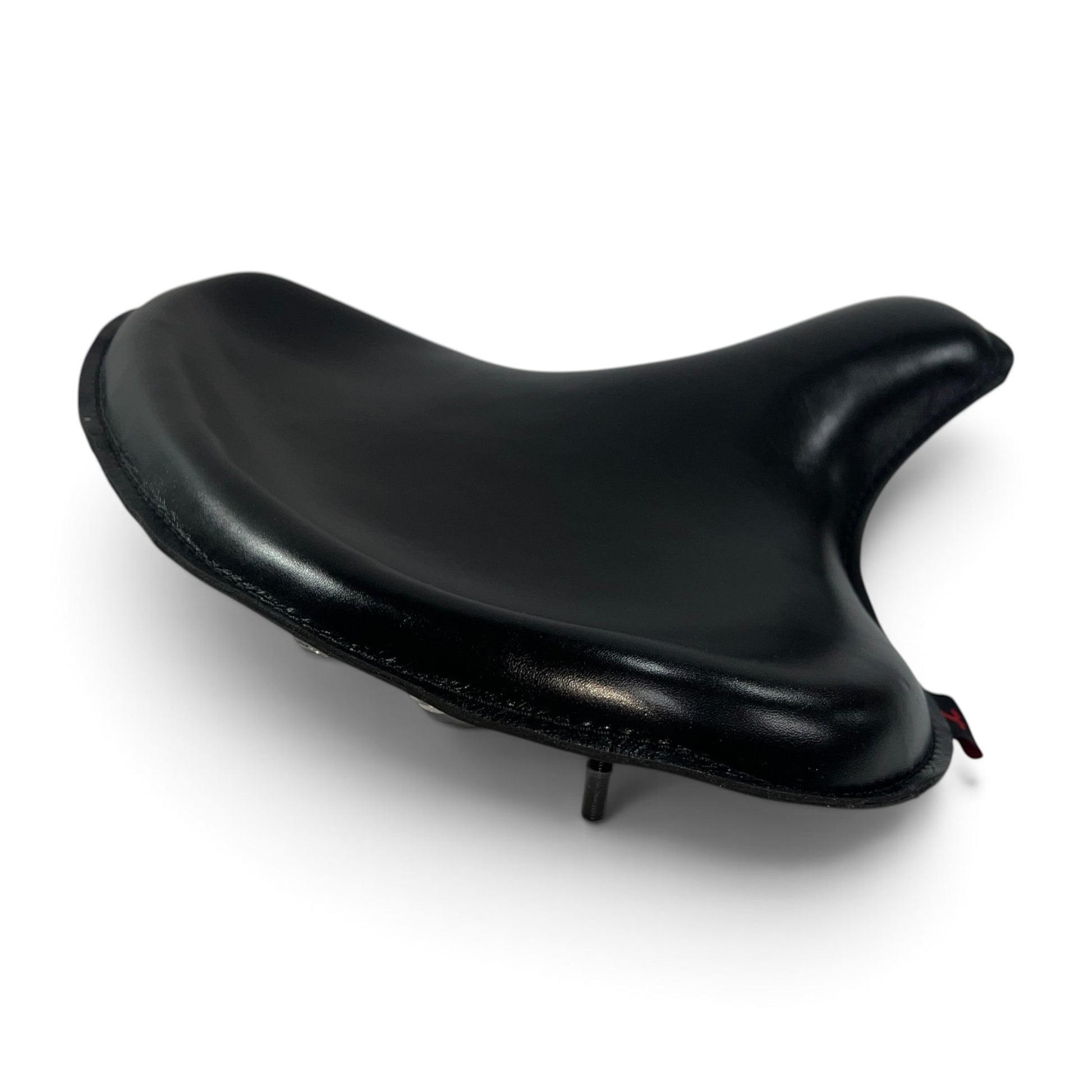 Champ Customs Shop black full grain leather solo seat for vintage Harley motorcycles with a durable steel base.